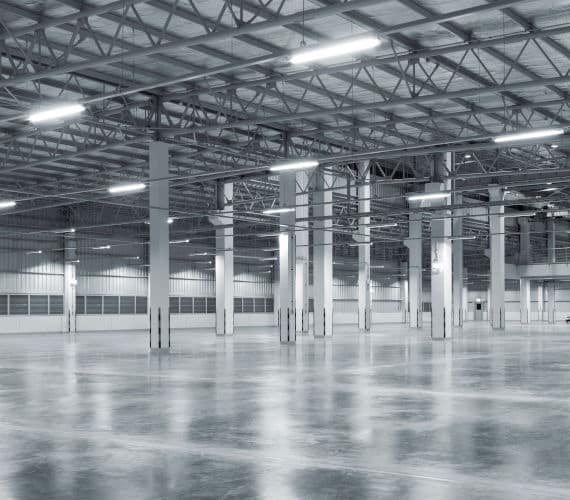 Large empty factory with polished concrete floors